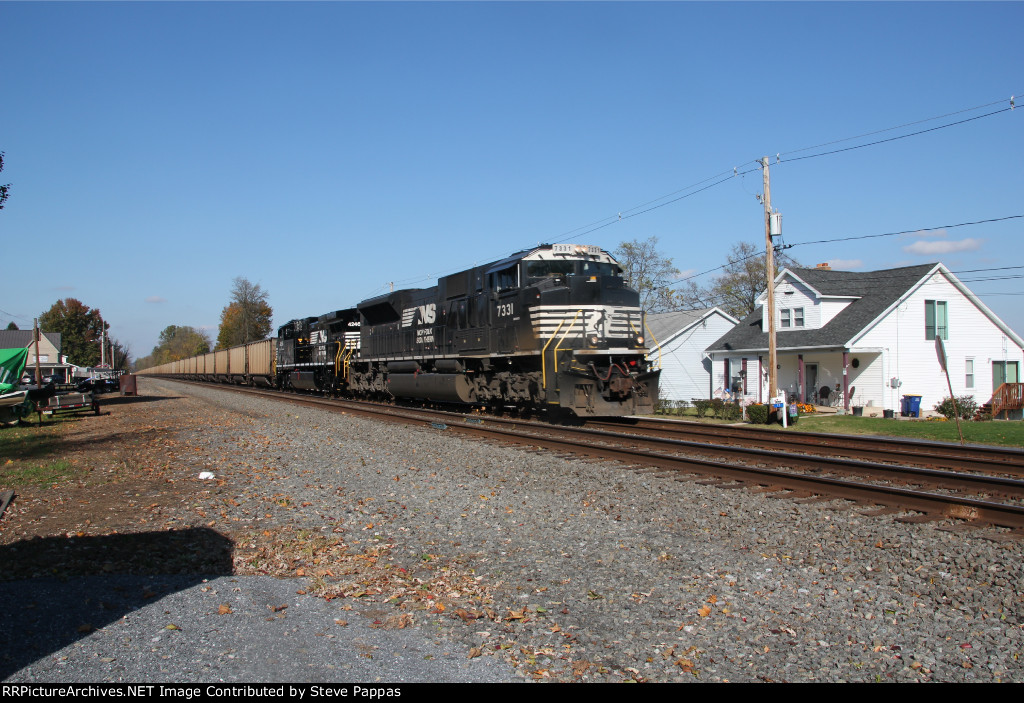 NS 7331 leads a coal train down the River Line